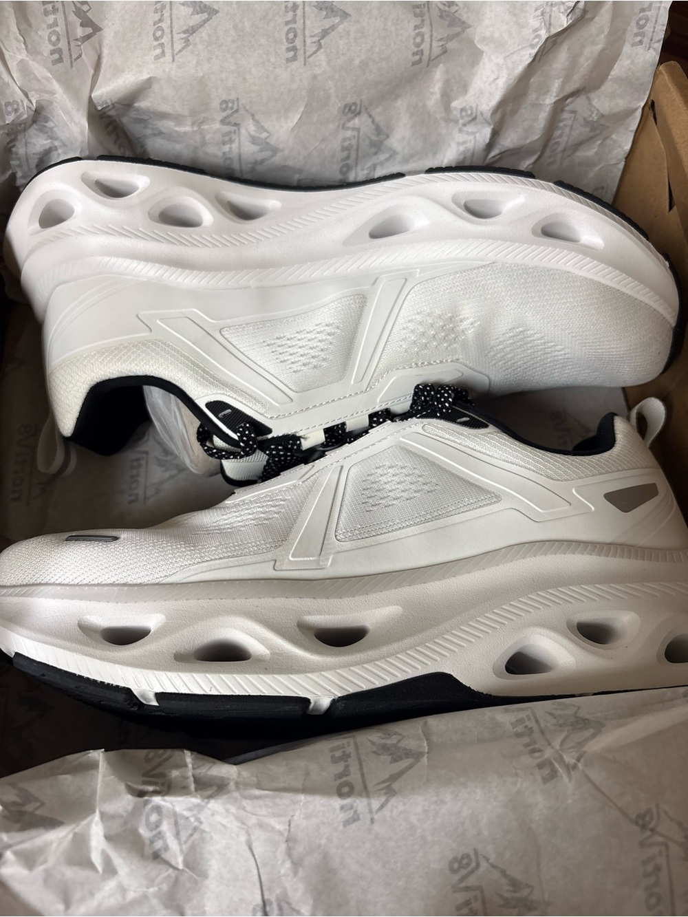 Men's White Athletic Running Shoes with Black Accents
